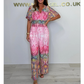 Bohemisk jumpsuit med vida ben och tryck